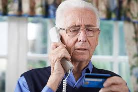 Grandparent talking on the phone to a scammer