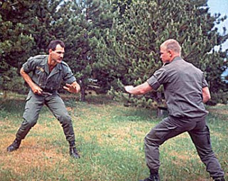 A picture of Nick Hughes doing hand to hand combat in the Foreign Legion