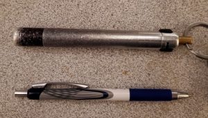 A pic of a Kubotan next to a pen showing the similarity in size for an article on TSA stupidity