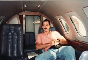 A picture of the author of the bodyguards vs buddyguards post traveling in a private jet while working as a bodyguard